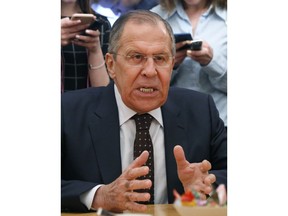 FILE - In this Tuesday, March 13, 2018 file photo, Russian Foreign Minister Sergey Lavrov gestures during a meeting with South Korean head of National Security Chung Eui-yong at the Russian foreign ministry in Moscow, Russia. Lavrov says Russia will kick out British diplomats in a worsening standoff over a nerve agent attack, but still isn't saying when or how many.