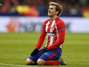 Atletico Madrid's Antoine Griezmann reacts during the Europa League Round of 16 first leg soccer match between Atletico Madrid and Lokomotiv Moscow at the Metropolitano stadium in Madrid, Thursday, March 8, 2018.