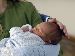 Baby Stefan Karadjordjevic of the Serbian throne-less royals, is held by his mother, Princess Danica Karadjordjevic, as his father Philip Karadjordjevic gently caresses the baby's head in Belgrade, Serbia, Friday, March 2, 2018. The new born is the first male baby born in Serbia in 90 years to the family which once ruled Yugoslavia but was exiled for decades during Communism.