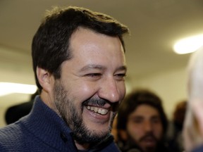 Leader of the League party, Matteo Salvini, smiles before casting his ballot at a polling station in Milan, Italy, Sunday, March 4, 2018. More than 46 million Italians were voting Sunday in a general election that is being closely watched to determine if Italy would succumb to the populist, anti-establishment and far-right sentiment that has swept through much of Europe in recent years.