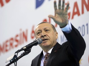 Turkey's President Recep Tayyip Erdogan, gestures as he delivers a speech during a rally of his ruling Justice and Development (AKP) Party's supporters, in Mersin, southern Turkey, Saturday, March 10, 2018. Erdogan has criticised NATO for not supporting the country's ongoing military operation against the Syrian Kurdish People's Protection Units or YPG, that started Jan. 20, to clear them from Afrin in northwestern Syria. Erdogan asked, "Hey NATO, where are you?" and accused the alliance of double standards.(Pool Photo via AP)