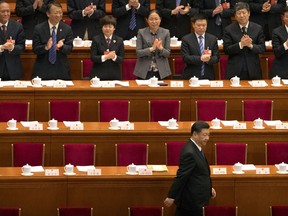 Chinese President Xi Jinping arrives for a plenary session of China's National People's Congress (NPC) in Beijing, Tuesday, March 13, 2018. China's rubber-stamp lawmakers on Sunday passed a historic constitutional amendment abolishing presidential term limits that will enable President Xi Jinping to rule indefinitely.
