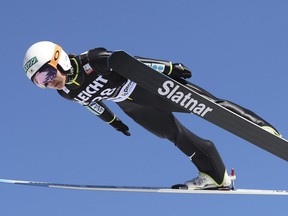 Japan's Sara Takanashi soars through the air during a training jump at the Ladies' Ski Jumping World Cup in Oberstdorf, Germany, Saturday, March 24, 2018. Takanashi won the competition.