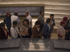 A fragile fragment of an enigmatic Dead Sea Scroll is on public display at the Israel Museum for the first time since its discovery 70 years ago, in Jerusalem, Tuesday, March. 20, 2018. The Genesis Apocryphon, the sole copy of an ancient Jewish text elaborating on stories from the first book of the Bible, dates to the 1st century BCE and was among the first seven scrolls found in the Judean Desert in 1947.