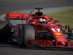 Ferrari driver Sebastian Vettel of Germany drives out of turn 2 during the second practice session at the Australian Formula One Grand Prix in Melbourne, Friday, March 23, 2018. The first race of the 2018 seasons is on Sunday.