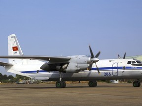 In this file photo dated Sunday, 9 March 2014, a Vietnamese air force aircraft AN-26 is seen at a base in Ho Chi Minh City, Vietnam. Russia's Defense Ministry says an AN-26 Russian military cargo plane of the same type has crashed in Syria.