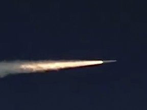 In this photo made from the footage taken from Russian Defense Ministry official web site on Sunday, March 11, 2018, a Russia's Kinzhal hypersonic missile flies during a test in southern Russia.