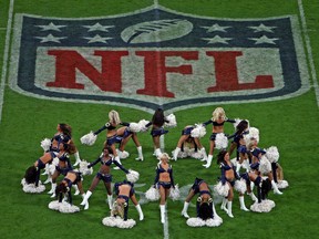 In this Oct. 28, 2012 file photo, St. Louis Rams cheerleaders perform at a game against the New England Patriots in London, England.
