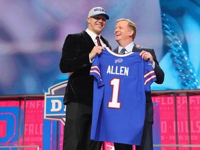 Buffalo Bills first-round draft pick Josh Allen poses with NFL commissioner Roger Goodell on April 26.