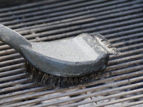 A barbecue brush in action.