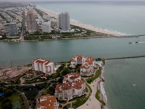The coast line of Miami Beach and part of Fisher Island (bottom) are seen June 3, 2014 in Miami, Florida.