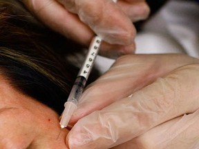 A women who called herself a doctor and injected Botox and other cosmetic pharmaceuticals has been ordered to stop by the B.C. Supreme Court.