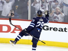 Winnipeg Jets forward Patrik Laine celebrates his goal against the Minnesota Wild on April 11. It was Laine's first career playoff goal.