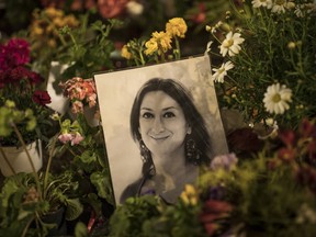 Flowers and tributes for the murdered Maltese journalist Daphne Caruana Galizia and Slovak journalists Jan Kuciak and his fiancee, Martina Kusnirova lay at the foot of the Great Siege monument on March 09, 2018 in Valletta, Malta.