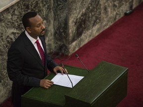 Abiy Ahmed, the newly elected chair of the Ethiopian Peoples' Revolutionary Democratic Front (EPRDF) addresses Ethiopian lawmakers after he was sworn in as the country's Prime Minister, Monday, April 2, 2018.  Ethiopia's legislature has elected young and outspoken Abiy Amhed as prime minister, amid hopes that he will be able to quell sustained anti-government protests in Africa's second most populous nation.
