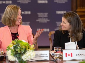 Canadian Foreign Minister Chrystia Freeland (left) and the High Representative of the European Union for Foreign Affairs and Security Policy, Federica Mogherini, speak during the opening of the G7 Foreign Ministers meeting in Toronto, Ontario, April 22, 2018.