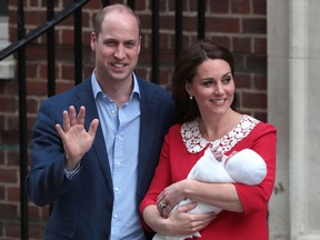 Britain's Prince William, Duke of Cambridge and Britain's Catherine, Duchess of Cambridge show their newly-born son, their third child, to the media outside the Lindo Wing at St Mary's Hospital in central London, on April 23, 2018.