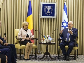 Israeli President Rueven Rivli, right sits with Romania's Prime Minister Viorica Dancila, during their meeting, in Jerusalem, Thursday, April 26, 2018.