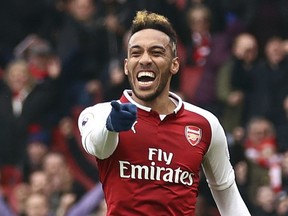 Arsenal's Pierre-Emerick Aubameyang celebrates scoring his side's first goal of the game, during the English Premier League soccer match between Arsenal and Southampton at the Emirates Stadium, in London, Sunday April 8, 2018.