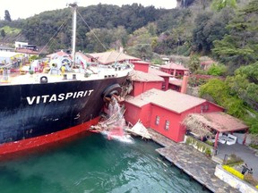 A tanker has crashed into a historic mansion on Bosporus strait, severely damaging the building, in Istanbul, Saturday, April 7, 2018  Turkey's official Anadolu news agency said the Maltese flagged ship's main machinery stopped Saturday, disabling its rudder and causing it to lose control. No one is reported injured.(DHA-Depo Photos via AP)