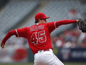 Los Angeles Angels starting pitcher Tyler Skaggs throws against the Cleveland Indians during the first inning of a baseball game Wednesday, April 4, 2018, in Anaheim, Calif.