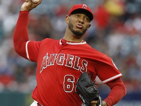 Los Angeles Angels starting pitcher JC Ramirez throws to an Oakland Athletics batter during the first inning of a baseball game in Anaheim, Calif., Saturday, April 7, 2018.