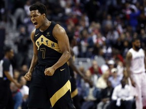 Toronto Raptors guard Kyle Lowry celebrates late in the second half of Game 6 of their NBA first-round playoff series against the Wizards on Friday night in Washington. The Raptors won 102-92 to close out the series.