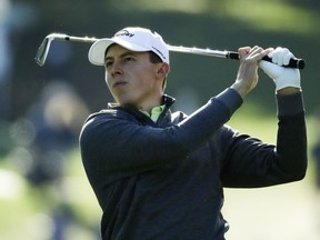 Matthew Fitzpatrick, of England, hits on the first hole during the first round at the Masters golf tournament Thursday, April 5, 2018, in Augusta, Ga.