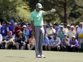 Sergio Garcia, of Spain, takes a drop on the 15th hole during the first round at the Masters golf tournament Thursday, April 5, 2018, in Augusta, Ga. Garcia shot an 8-over 13 on the hole.