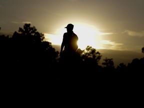 Adam Hadwin, of Canada, looks over the 17th green during the second round at the Masters golf tournament Friday, April 6, 2018, in Augusta, Ga.