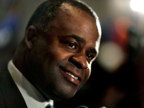 FILE - In this Nov. 7, 2017 file photo, Atlanta Mayor Kasim Reed greets supporters for city councilwoman and mayoral candidate Keisha Lance Bottoms, whom Reed endorsed to replace him, at an election night party in Atlanta. City leaders say they want to investigate whether thousands of dollars of employee bonuses - including prizes for lip sync and ugly sweater contests - were a proper use of tax dollars. Reed's administration gave city employees more than $518,000 in bonuses during Reed's last days in office.