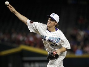 Arizona Diamondbacks starting pitcher Zack Greinke throws to a San Francisco Giants batter during the first inning of a baseball game Thursday, April 19, 2018, in Phoenix.