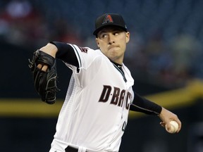 Arizona Diamondbacks pitcher Patrick Corbin throws in the first inning during a baseball game against the San Francisco Giants, Tuesday, April 17, 2018, in Phoenix.
