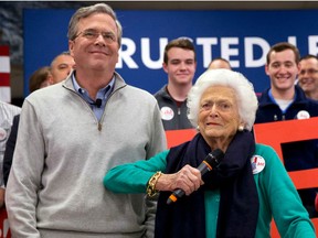 In this Feb. 4, 2016, file photo, Barbara Bush, right, jokes with her son Republican presidential candidate, former Florida Gov. Jeb Bush, while introducing him at a town hall meeting at West Running Brook Middle School in Derry, N.H. Barbara Bush, the snowy-haired first lady whose plainspoken manner and utter lack of pretense made her more popular at times than her husband, President George H.W. Bush, died Tuesday, April 17, 2018.