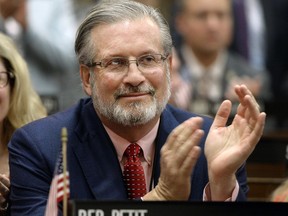 FILE - In this Jan. 4, 2017, file photo, Connecticut State Rep. Dr. William Petit, R-Plainville, smiles during opening session at the state Capitol in Hartford, Conn. Petit, the survivor of a 2007 home invasion in which his wife and daughters were killed, is considering a run for the seat held by U.S. Rep. Elizabeth Esty, who announced Monday, April 2, 2018, she would not seek re-election.