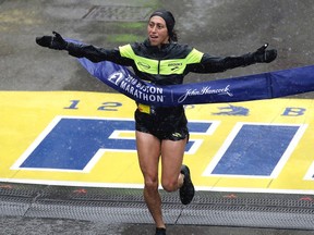 Desiree Linden, of Washington, Mich., wins the women's division of the 122nd Boston Marathon on Monday, April 16, 2018, in Boston. She is the first American woman to win the race since 1985.