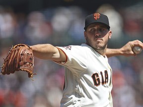 San Francisco Giants pitcher Ty Blach works against the Los Angeles Dodgers during the first inning of a baseball game Sunday, April 8, 2018, in San Francisco.
