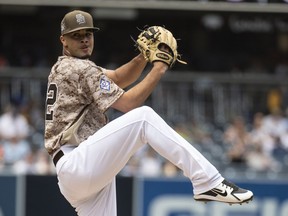San Diego Padres starting pitcher Joey Lucchesi delivers during the first inning of a baseball game against the San Francisco Giants in San Diego, Sunday, April, 15, 2018.