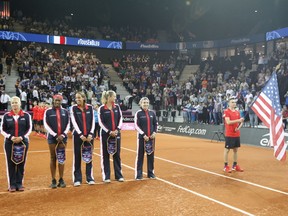 From left, United States' Fed Cup team members, captain Kathy Rinaldi, Sloane Stephens, Madison Keys, Coco Vandeweghe and Bethanie Mattek Sands, during the team presentation, prior to the Fed Cup semifinal, in Aix-en-Provence, southern France, Saturday, April 21, 2018.