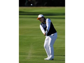 Inbee Park, of South Korea, hits from the fairway on the 13th hole during the final round of the HUGEL-JTBC LA Open golf tournament at Wilshire Country Club Sunday, April 22, 2018, in Los Angeles.