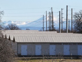 FILE - In this Dec. 15, 2015, file photo, a commercial storage unit facility is shown where two children were found dead in Redding, Calif. A jury in Northern California found a 20-year-old man guilty in the torture, starving and beating of two children whose bodies were found in the storage unit. A jury on Monday, April 23, 2018, found Gustavo Curiel guilty in the 2015 killings of 7-year-old Shaun Tara and his 3-year-old sister, Delylah Tara. The jury also found him guilty of torturing their older sister in their Salinas apartment. Curiel's former girlfriend and the children's aunt, Tami Huntsman, pleaded guilty in February to two counts of murder.