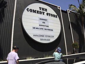 The Comedy Store in West Hollywood, Calif., adorned with the names of hundreds of great comedians who have passed through its doors, honors founder Mitzi Shore, Wednesday, April 11, 2018. Shore died earlier Wednesday at 87. Shore was one of the most influential figures in stand-up for more than four decades. Spokeswoman Jodi Gottlieb in a statement called her "an extraordinary businesswoman and decades ahead of her time who cultivated and celebrated the artistry of stand-up comedy."