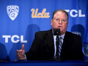FILE - In this Nov. 27, 2017, file photo, new UCLA head football coach Chip Kelly speaks during a news conference in Los Angeles. The Pac-12 has five new coaches this season, so there was extra importance on spring football this year at UCLA, the two Arizona schools and the two Oregon schools.