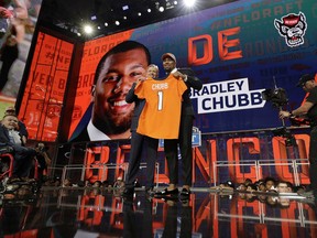 Commissioner Roger Goodell, left, poses with North Carolina State's Bradley Chubb after Chubb was selected by the Denver Broncos during the first round of the NFL football draft, Thursday, April 26, 2018, in Arlington, Texas.