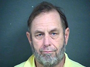 FILE - This April 4, 2018 file booking photo provided by the Wyandotte County Detention Center, shows Jeff Henry, co-owner of the Schlitterbahn water park, who is charged in a 10-year-old boy's decapitation death on a 17-story waterslide that was promoted as the world's largest. Henry pleaded not guilty Thursday, April 5, 2018, to second-degree murder in the in the 2016 death of Caleb Schwab on the massive waterslide. (Wyandotte County Detention Center via AP, File)