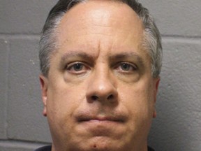 This undated photo provided by the Harris County District Attorney's Office in Houston, shows Gregory Lueb. Lueb who is second in command of the Harris County Treasurer's Office is accused of stealing tens of thousands of dollars from a county credit union to pay a dominatrix who was blackmailing him. He was arrested Thursday, April 5, 2018, and charged with felony theft of up to $30,000. Prosecutors say he was fired from the treasurer's office this week. (Harris County District Attorney's Office via AP)