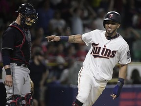 Minnesota Twins' Eddie Rosario scores in the 16h inning to give the Twins a 2-1 win over the Cleveland Indians in a baseball game at Hiram Bithorn Stadium in San Juan, Puerto Rico, early Thursday, April 19, 2018.