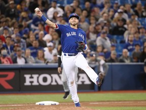 Toronto Blue Jays third baseman Josh Donaldson throws to first against the Chicago White Sox on April 3.