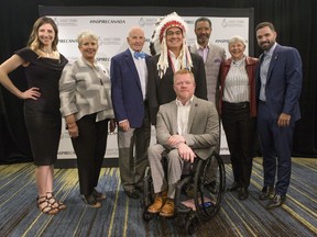 Inductees cross country skier Chandra Crawford, left to right, Maureen Baker, daughter of broadcasting pioneer Mary Baker, former Toronto Maple Leafs player Dave Keon, Indigenous sport organizer and advocate Wilton Littlechild, wheelchair racer Jeff Adams, CFL legend Damon Allen, rower Dr. Sandra Kirby, and diver Alexandre Despatie pose for a photo following a news conference to announce inductees to Canada's Sports Hall of Fame's 'Class of 2018' in Toronto on Thursday, April 26, 2018.