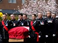 Pallbearers carry the casket of Victoria Police Const. Ian Jordan during a funeral service at Christ Church Cathedral in Victoria, B.C., on Thursday April 19, 2018.